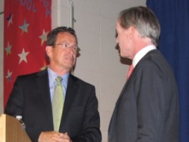 Dannel P. Malloy and Tom Foley facing each other in 2010.