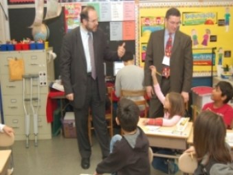 Education Commissioner Stefan Pryor (left)