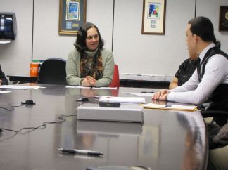 DCF Commissioner Joette Katz talk with some older youth in state custody.
