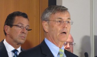 Transportation Commissioner James Redeker (foreground) and Gov. Dannel P. Malloy (background)