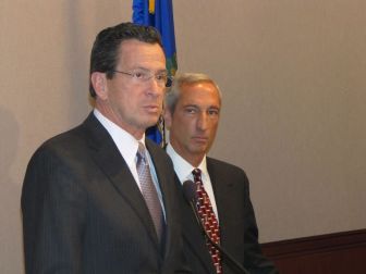 Gov. Dannel P. Malloy, left, with state Insurance Commissioner Thomas Leonardi
