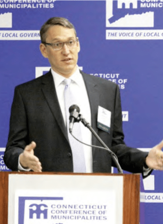 Ben Barnes, the governor's budget chief, before the Connecticut Conference of Municipalities