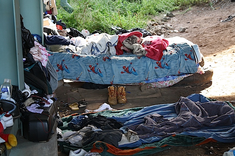 Makeshift beds under the highway in the north end of Hartford. (photo by Jose Vega)