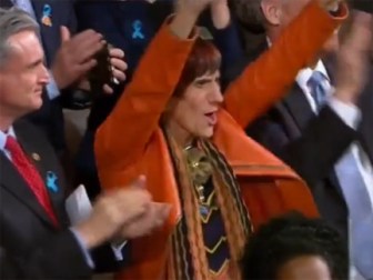 U.S Rep. Rosa DeLauro cheers as President Obama calls for equal pay for women.