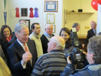 Tom Foley and his wife, Leslie, at right, greet supporters at VFW Post 201 in Waterbury.
