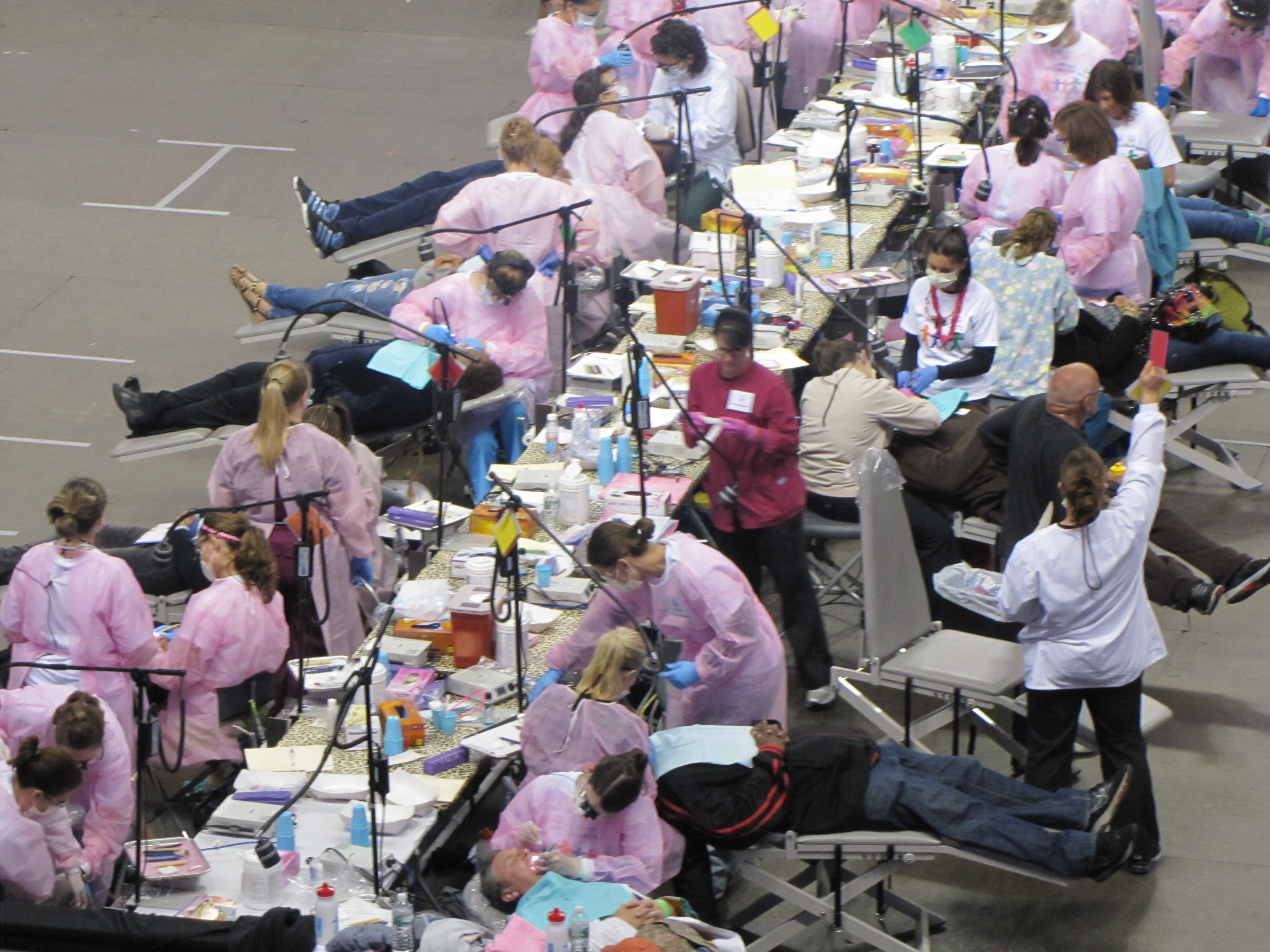 A picture of a row of patients receiving dental care at last year's Mission of Mercy free dental clinic in Bridgeport.