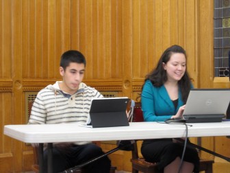 Elijah Alvarez and Lissette Rodriguez demonstrate the new online voter registration system.