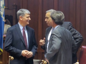 Williams talking to Republican Sens. Tony Guglielmo and Scott Frantz after returning to the Senate after telling Democrats of his re-election plans.