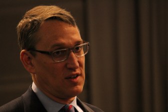 Ben Barnes, the governor's budget chief, presents the budget