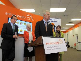 Kevin Counihan, the chief executive of Access Health CT with Gov. Dannel P. Malloy, Lt. Gov. Nancy Wyman and U.S. Rep. Rosa DeLauro.