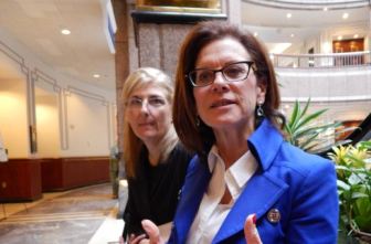 This is a photo of Justine Rakich-Kelly, left, and Barbara Aaron, who say guardians ad litem are critical in looking out for children during custody and divorce cases.