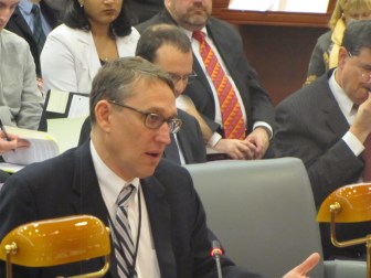 Gov. Dannel P. Malloy's budget chief, Benjamin Barnes, addresses the Finance Committee