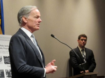 Tom Foley introduces urban policy recommendations of the Connecticut Policy Institute. Watching it the group's executive director, Ben Zimmer.