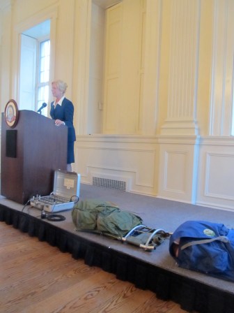 Dean arrived with backpacks, symbols of the burdens the state places on taxpayers.