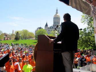Ted Kennedy Jr. addressing a labor rally in 2011. In the background is the State Capitol.