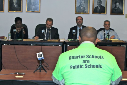 State Board of Education members listen to testimony from a Bridgeport parent that supports more charter schools opening in his community