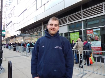 This is a photo of Ken Luce II who got a tooth extracted at the free dental clinic.