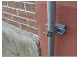 This is a photo of a protruding, uncovered bolt in an outdoor play area at a Connecticut day care center.