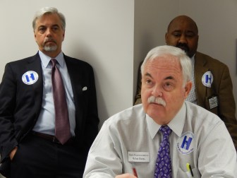 Rep. Whit Betts, R-Bristol. Behind him are Tenet Healthcare Senior Vice President Trip Pilgrim and Bristol Hospital lobbyist Chris Cloud.