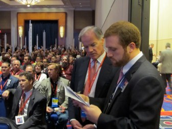 Tom Foley, left, monitoring the balloting for governor.