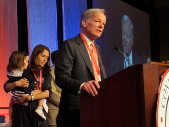 Tom Foley accepts the GOP endorsement. His wife, Leslie, stands with one of their twins.