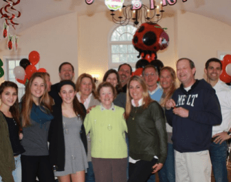 Lucie B. McKinney, center, at her 80th birthday in February.
