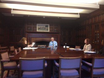 Empty chairs: The Board of Regents voted by phone.