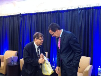 Guilford businessman K.J. Lee (left) talks with Gov. Dannel P. Malloy follwoing Wednesday's forum at the Mark Twain Museum Center