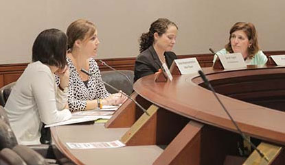 State Rep. Mae Flexer, second from left, and Child Advocate Sarah Eagan, second from right, at last week's talks. 