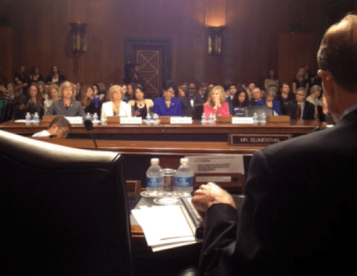 Looking over Connecticut Sen. Richard Blumenthal's shoulder at a hearing on abortion laws.