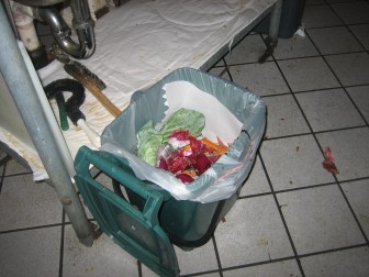 A small food waste bin now sits in the Bridgewater Village Store's kitchen as part of a food waste curbside pickup pilot program. All food scraps now go into the bin instead of the regular trash.