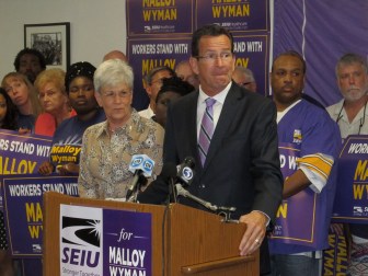 Gov. Dannel P. Malloy and Lt. Gov. Nancy Wyman accepting the SEIU endorsement.