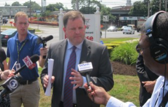 GOP gubernatorial candidate John McKinney discusses his tax cut plan outside of a Stratford shopping center