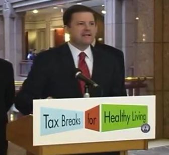 This is a picture of Sen. John McKinney in 2008, announcing a GOP proposal to offer tax credits for people who get preventive care.
