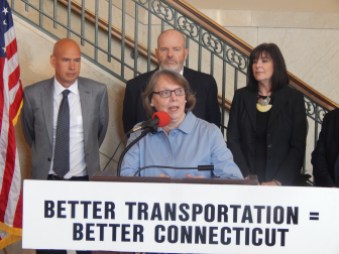 Former Transportation Strategy Board member Karen Burnaska and other advocates challenge gubernatorial candidates to focus on state's transportation needs.