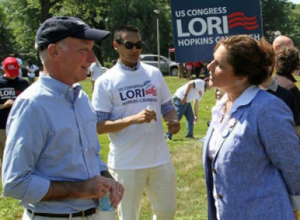 Lori Hopkins-Cavanagh engages Rep. Joe Courtney in conversation at a public event.