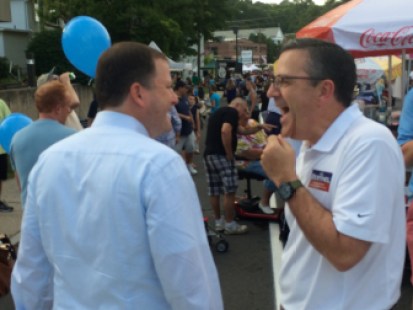 McKinney shares a laugh with Brian Flaherty, a former GOP legislator.