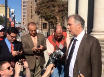 Reid H. Weingarten tells reporters Rowland will appeal.