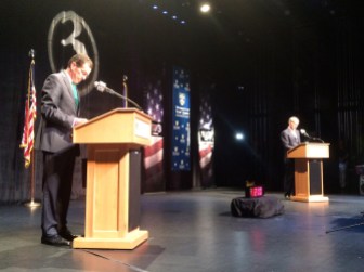 Gov. Dannel P. Malloy checks his notes before the broadcast.