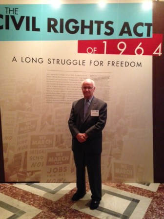 Robert Forrester, CEO of Newman's Own, stands at the civil rights exhibit at the Library of Congress.