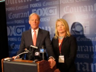 Tom Foley talked to reporters, accompanied by his running mate, Heather Bond Somers.