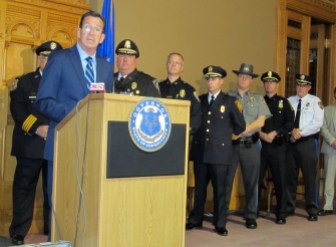 Gov. Dannel P. Malloy was backed by police chiefs as he announced crime statstics.