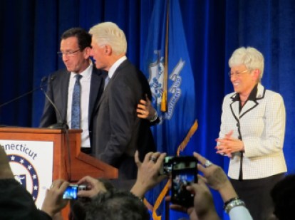 Malloy embracing Bill Clinton at a rally in 2014. He is returning the favor, endorsing Hillary Clinton for president.