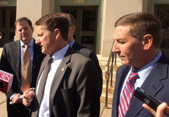 GOP chairman Jerry Labriola Jr., flanked by Sens. John McKinney and Len Fasano.