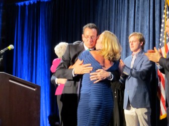 Gov. Dannel P. Malloy embraces his wife, Cathy. 