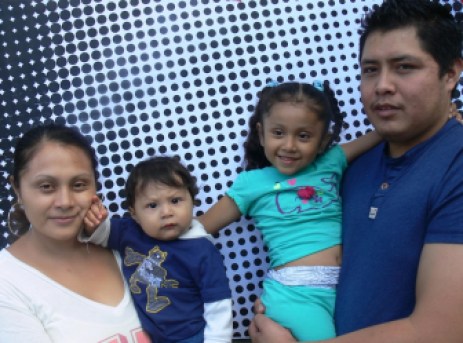 Jose Luis Piscil, an undocumented worker from New Haven, with his family in Washington, D.C., Thursday.