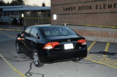 Adam Lanza's car parked outside of Sandy Hook Elementary School