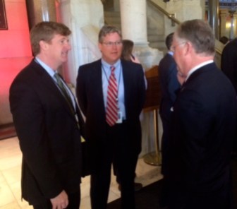 Ted Kennedy Jr, flanked by his brother, Patrick, and House Speaker J. Brendan Sharkey on opening day of the 2015 session.