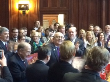 Sen. Andrew Maynard, D-Stonington, acknowledges applause on his return to the Senate.