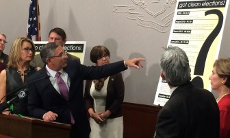 Senate Minority Leader Len Fasano points to GOP  campaign reforms.